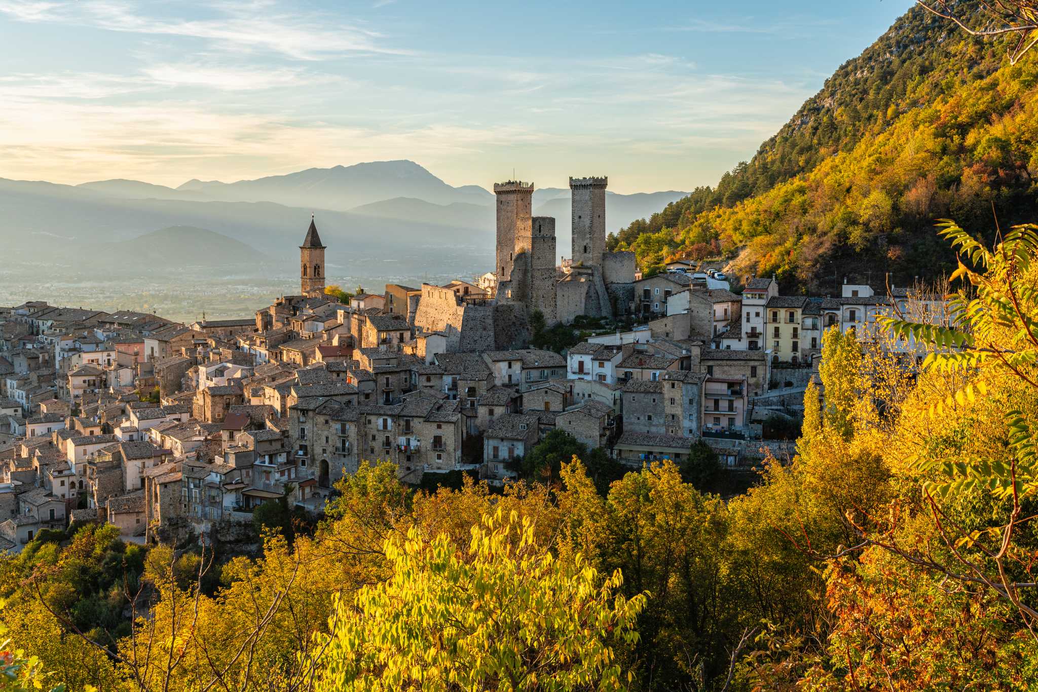 Castle towers above the medieval village of Pacentro in Abruzzo in late autumn.
