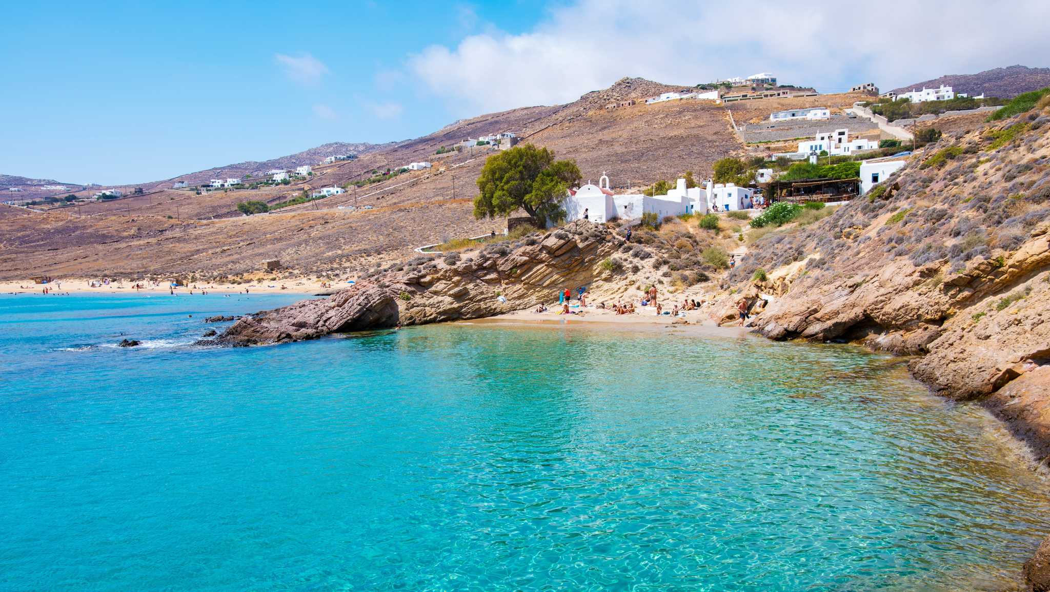 Agios Sostis is a quiet, unspoiled beach in Mykonos, perfect for a secluded getaway full of natural beauty and a touch of adventure.