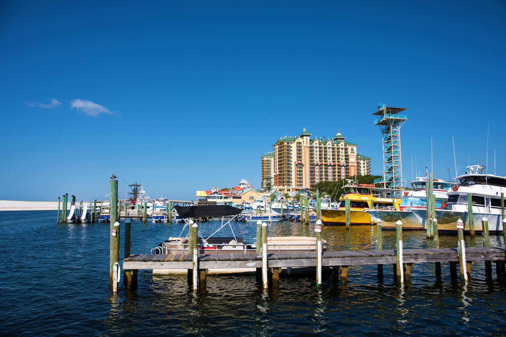 Visit Destin Harbor Boardwalk on the way from fort-walton-beach-fl-us to panama-city-fl-us with Daytrip