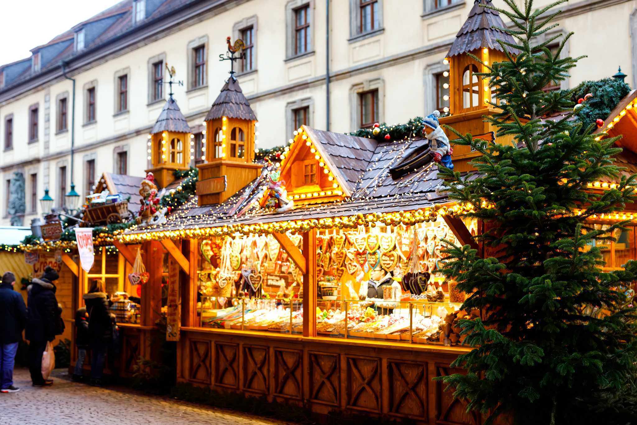 Elaborately decorated traditional Christmas market stall in Nuremberg.