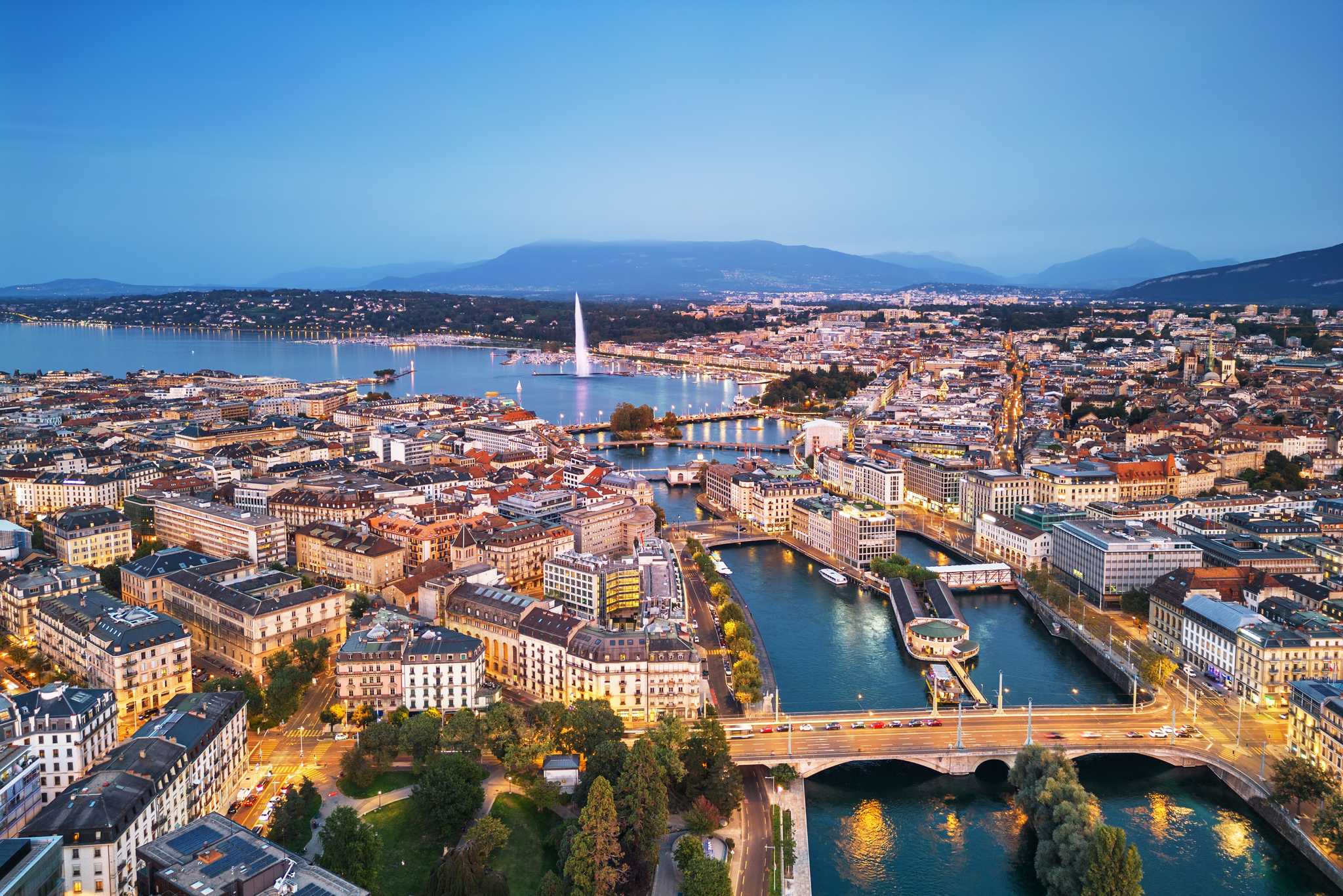 Genoa as seen from above, with the sea in the background and the grand canal running through town.