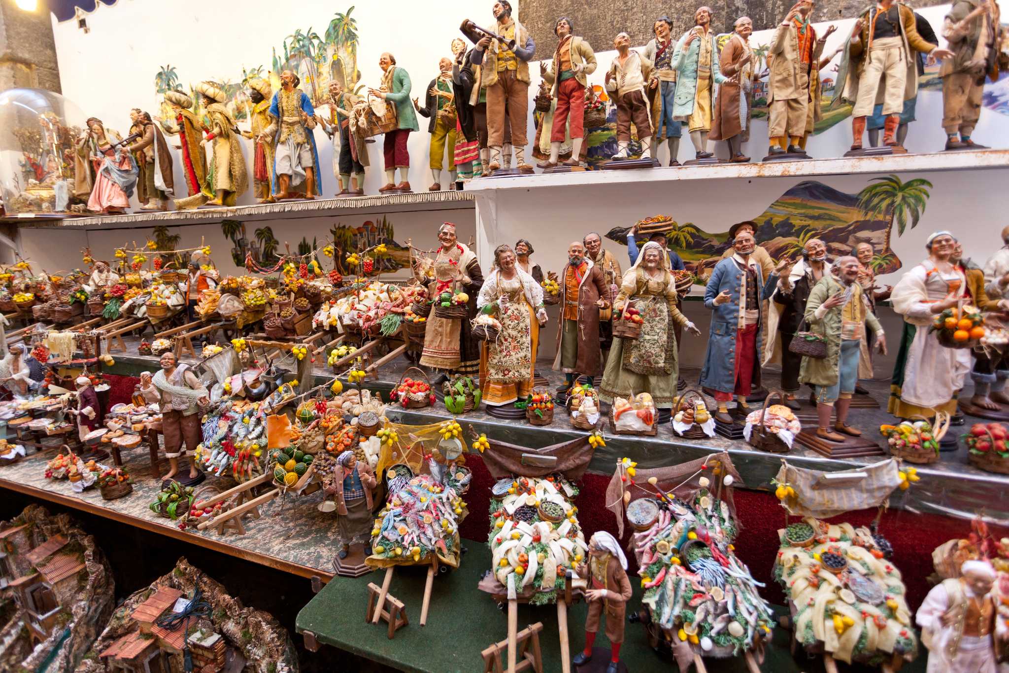 Shelves of wooden nativity figures in a shop in Naples.