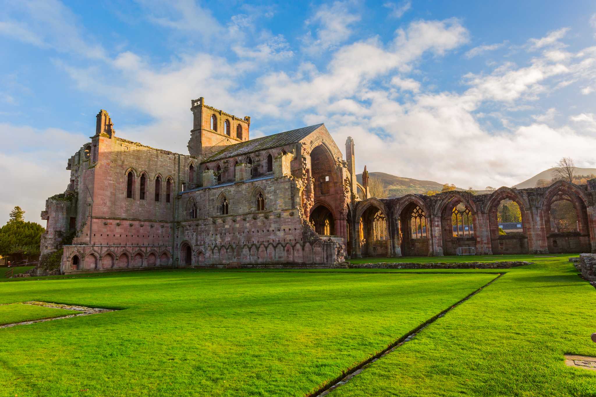 Itinerary stop at Melrose Abbey on private day trip from Edinburgh