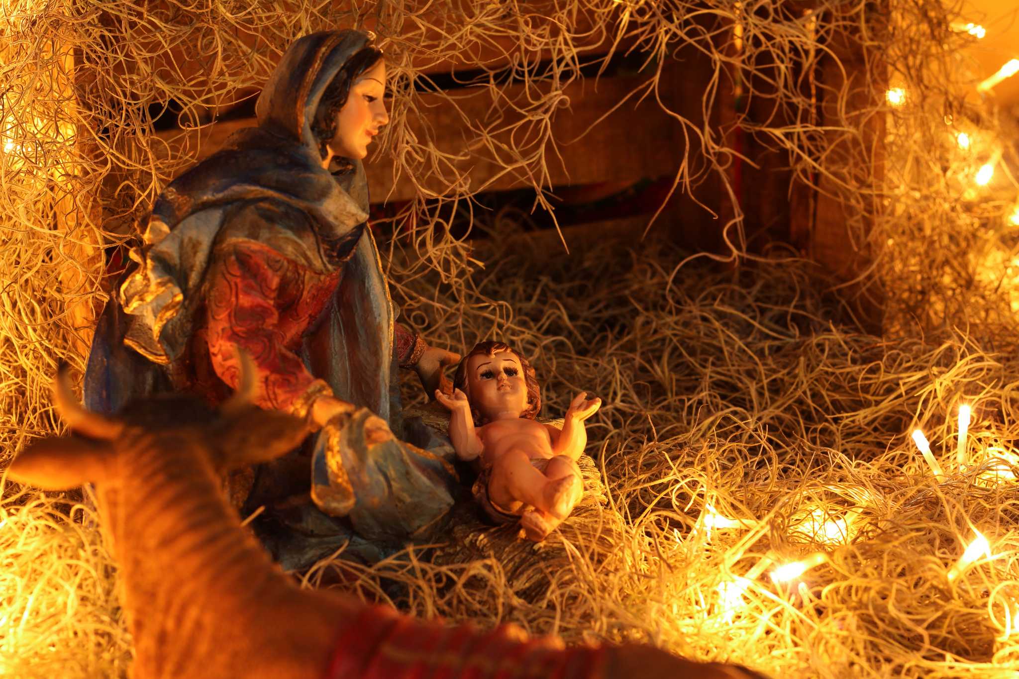 Handcrafted and warmly lit nativity scene of Mary and Jesus in Atlixco, Mexico.