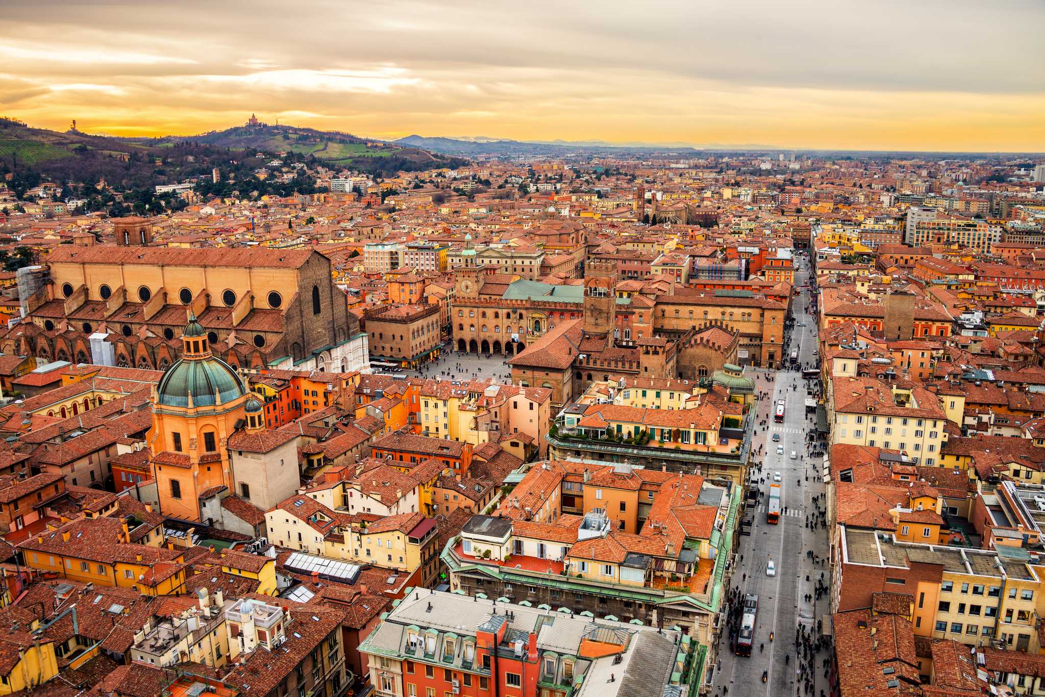 Bologna’s streets from above in the warm light of golden hour.
