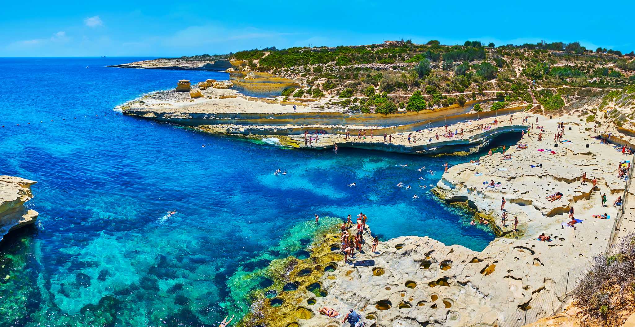 Itinerary stop at St Peter's Pool on private day trip from Valletta