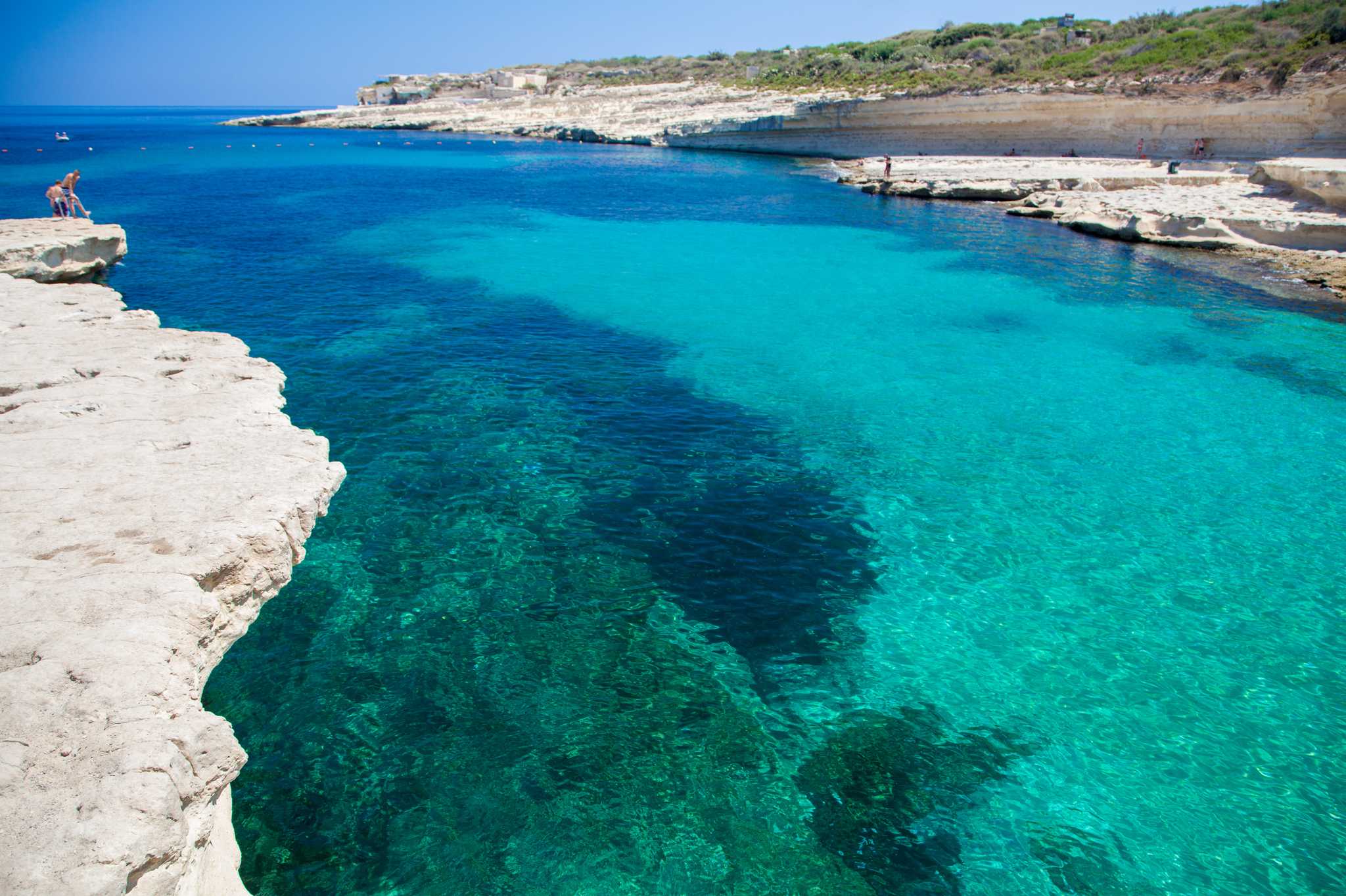 Itinerary stop at St Peter's Pool on private day trip from Valletta