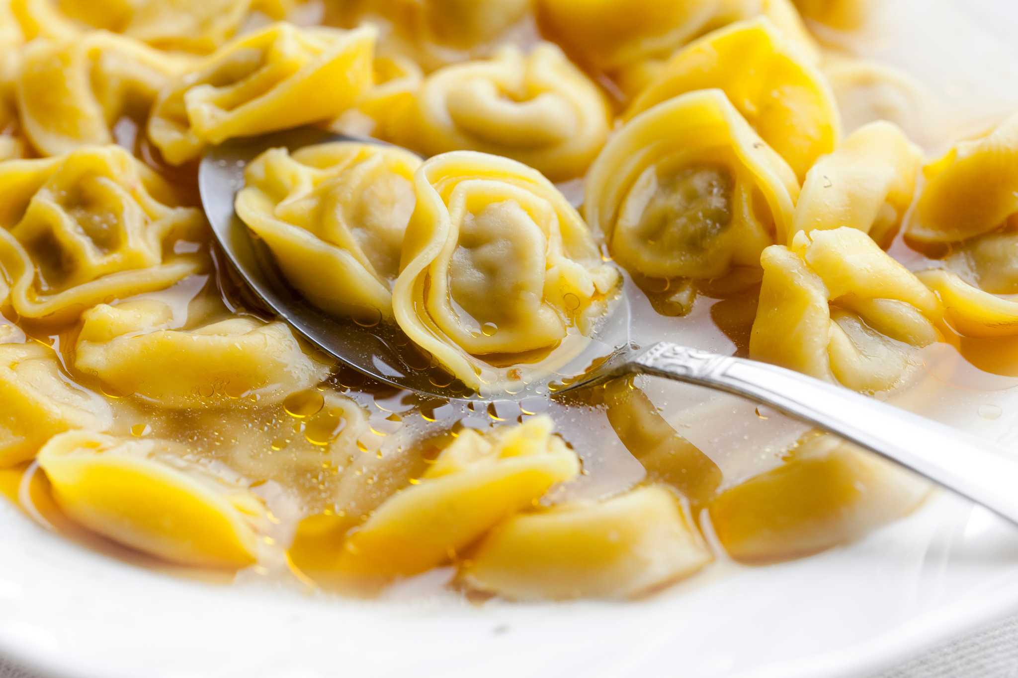 Tortellini in brodo, a soup made of tortellini served in Bologna.